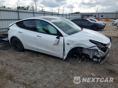 Czwarte zdjęcie samochodu z boku: 2021 TESLA MODEL Y VIN:5YJYGDEE7MF240566 - miniatura