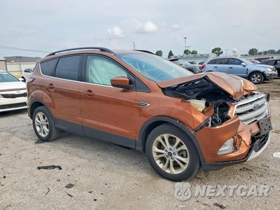 Czwarte zdjęcie samochodu z boku: 2017 FORD ESCAPE SE VIN:1FMCU9GD1HUC83992 - miniatura