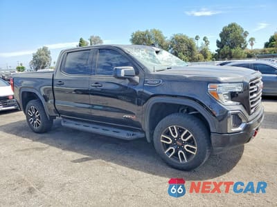 Czwarte zdjęcie samochodu z boku: 2020 GMC SIERRA K1500 AT4 VIN:3GTP9EEL6LG283752 - miniatura
