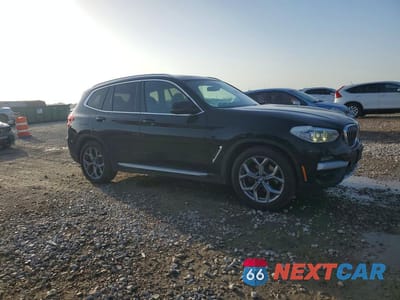 Czwarte zdjęcie samochodu z boku: 2021 BMW X3 XDRIVE30I VIN:5UXTY5C08M9E36967 - miniatura