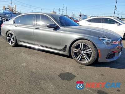 Czwarte zdjęcie samochodu z boku: 2016 BMW 750 XI VIN:WBA7F2C56GG419212 - miniatura