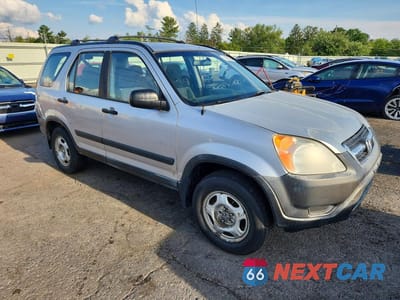 Czwarte zdjęcie samochodu z boku: 2002 HONDA CR-V LX VIN:JHLRD78472C021881 - miniatura