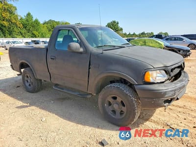 Czwarte zdjęcie samochodu z boku: 2002 FORD F150 VIN:1FTRF18W02NA26544 - miniatura