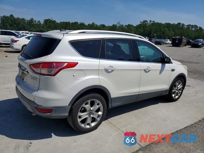 Trzecie zdjęcie samochodu z tyłu: 2014 FORD ESCAPE TITANIUM VIN:1FMCU0JX8EUE20405 - miniatura