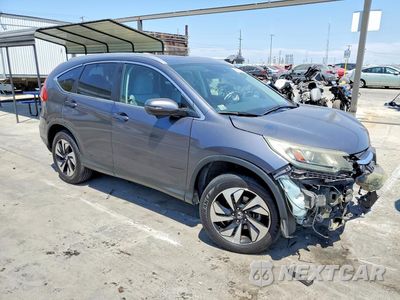 Czwarte zdjęcie samochodu z boku: 2015 HONDA CR-V TOURING VIN:5J6RM3H93FL018736 - miniatura