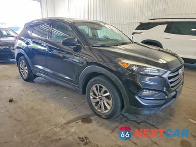 Czwarte zdjęcie samochodu z boku: 2016 HYUNDAI TUCSON SE VIN:KM8J3CA43GU146843 - miniatura