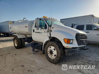 Czwarte zdjęcie samochodu z boku: 2000 FORD F650 SUPER DUTY WATER TRUCK VIN:3FDNF6549YMA02997 - miniatura