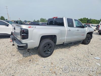 Trzecie zdjęcie samochodu z tyłu: 2016 CHEVROLET SILVERADO K1500 LT VIN:1GCVKREC9GZ299114 - miniatura
