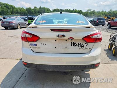 Zdjęcie 6 z 13 samochodu: 2013 FORD FOCUS TITANIUM VIN:1FADP3J26DL155161 - miniatura