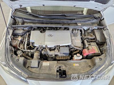 Zdjęcie 11 z 12 samochodu: 2021 TOYOTA PRIUS XLE AWD-E VIN:JTDL9MFU7M3025650 - miniatura