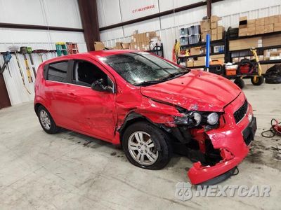 Czwarte zdjęcie samochodu z boku: 2014 CHEVROLET SONIC LT VIN:1G1JC6SG3E4137323 - miniatura