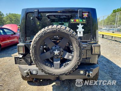 Zdjęcie 6 z 12 samochodu: 2013 JEEP WRANGLER UNLIMITED SAHARA VIN:1C4BJWEG2DL508778 - miniatura