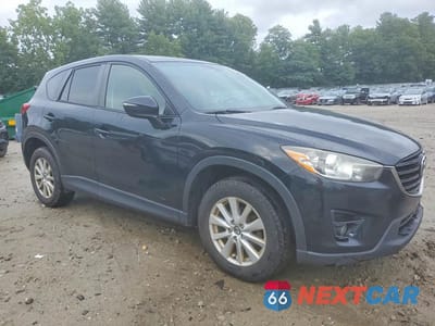 Czwarte zdjęcie samochodu z boku: 2016 MAZDA CX-5 TOURING VIN:JM3KE4CYXG0779590 - miniatura