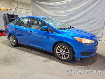 Czwarte zdjęcie samochodu z boku: 2016 FORD FOCUS SE VIN:1FADP3F23GL248118 - miniatura