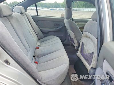 Zdjęcie 10 z 12 samochodu: 2004 HYUNDAI ELANTRA GLS VIN:KMHDN46D14U823468 - miniatura