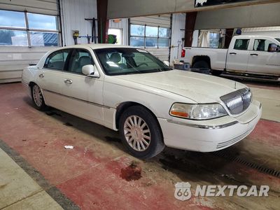 Czwarte zdjęcie samochodu z boku: 2003 LINCOLN TOWN CAR EXECUTIVE VIN:1LNHM81W23Y670143 - miniatura