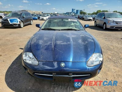 Piąte zdjęcie samochodu w środku: 2000 JAGUAR XK8 VIN:SAJJA42C5YNA10400 - miniatura