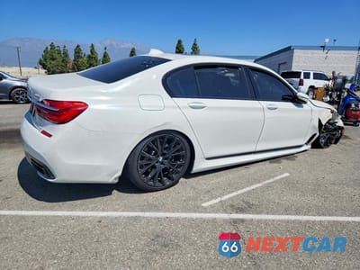 Trzecie zdjęcie samochodu z tyłu: 2019 BMW 740 I VIN:WBA7E2C55KB217440 - miniatura