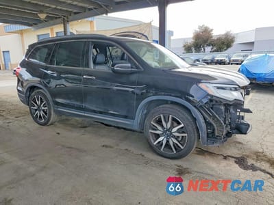 Czwarte zdjęcie samochodu z boku: 2022 HONDA PILOT TOURING VIN:5FNYF6H97NB013733 - miniatura