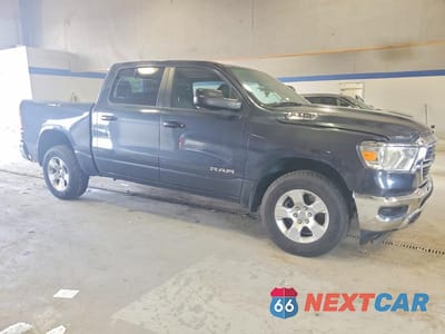 Czwarte zdjęcie samochodu z boku: 2021 RAM 1500 BIG HORN/LONE STAR VIN:1C6SRFFT3MN619100 - miniatura