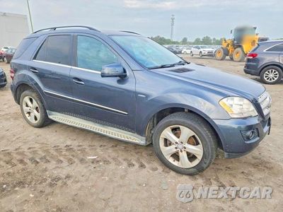 Czwarte zdjęcie samochodu z boku: 2011 MERCEDES-BENZ ML 350 BLUETEC VIN:4JGBB2FB2BA698823 - miniatura