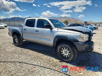 Czwarte zdjęcie samochodu z boku: 2014 TOYOTA TACOMA V6 VIN:3TMLU4EN4EM153014 - miniatura