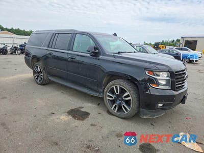 Czwarte zdjęcie samochodu z boku: 2018 CHEVROLET SUBURBAN K1500 PREMIER VIN:1GNSKJKC5JR261399 - miniatura
