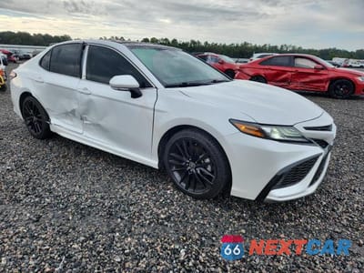 Czwarte zdjęcie samochodu z boku: 2023 TOYOTA CAMRY XSE VIN:4T1K61AK0PU727814 - miniatura