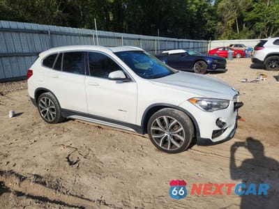 Czwarte zdjęcie samochodu z boku: 2017 BMW X1 XDRIVE28I VIN:WBXHT3C30H5F70537 - miniatura
