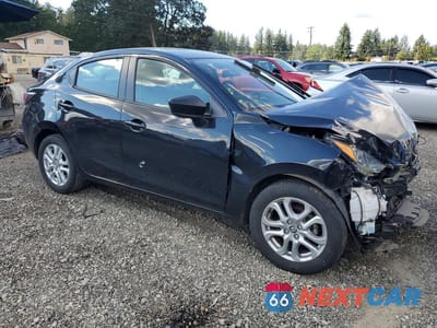 Czwarte zdjęcie samochodu z boku: 2018 TOYOTA YARIS IA BASE VIN:3MYDLBYV8JY317800 - miniatura