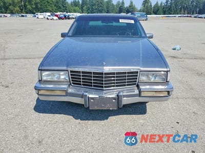Piąte zdjęcie samochodu w środku: 1993 CADILLAC DEVILLE VIN:1G6CD53B7P4329960 - miniatura