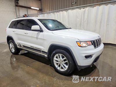 Czwarte zdjęcie samochodu z boku: 2018 JEEP GRAND CHEROKEE LAREDO VIN:1C4RJFAG4JC333899 - miniatura