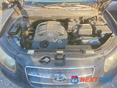 Zdjęcie 12 z 13 samochodu: 2007 HYUNDAI SANTA FE SE VIN:5NMSH13E77H109340 - miniatura