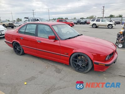 Czwarte zdjęcie samochodu z boku: 1995 BMW 540 I VIN:WBAHE5323SGA65157 - miniatura