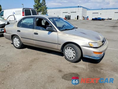 Czwarte zdjęcie samochodu z boku: 1994 TOYOTA COROLLA DX VIN:1NXAE09B5RZ219032 - miniatura