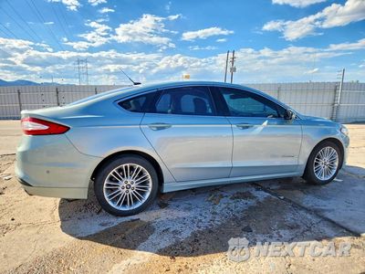Trzecie zdjęcie samochodu z tyłu: 2013 FORD FUSION SE HYBRID VIN:3FA6P0LU4DR260787 - miniatura