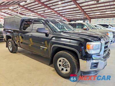Czwarte zdjęcie samochodu z boku: 2015 GMC SIERRA K1500 VIN:1GTV2TEC6FZ381409 - miniatura