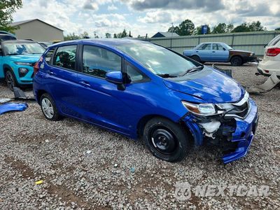 Czwarte zdjęcie samochodu z boku: 2018 HONDA FIT LX VIN:3HGGK5H40JM731153 - miniatura