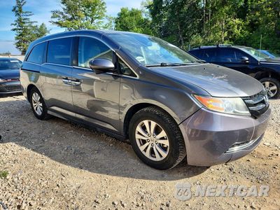 Czwarte zdjęcie samochodu z boku: 2014 HONDA ODYSSEY EXL VIN:5FNRL5H61EB124503 - miniatura