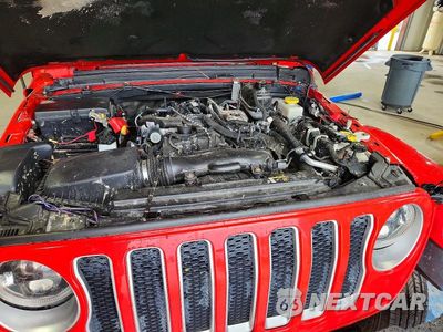 Zdjęcie 12 z 13 samochodu: 2019 JEEP WRANGLER UNLIMITED SAHARA VIN:1C4HJXEN0KW515173 - miniatura