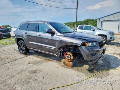 Czwarte zdjęcie samochodu z boku: 2015 JEEP GRAND CHEROKEE LAREDO VIN:1C4RJFAG0FC660355 - miniatura