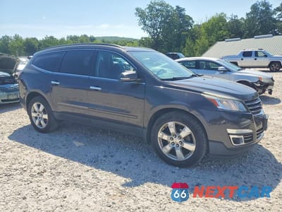 Czwarte zdjęcie samochodu z boku: 2016 CHEVROLET TRAVERSE LTZ VIN:1GNKVJKD1GJ318284 - miniatura
