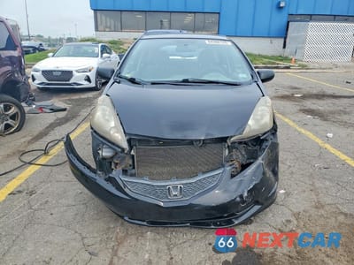 Piąte zdjęcie samochodu w środku: 2010 HONDA FIT VIN:JHMGE8H21AC038260 - miniatura