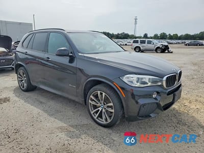 Czwarte zdjęcie samochodu z boku: 2014 BMW X5 SDRIVE35I VIN:5UXKR2C56E0H31218 - miniatura