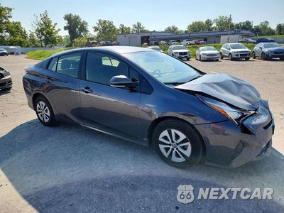 Czwarte zdjęcie samochodu z boku: 2017 TOYOTA PRIUS THREE VIN:JTDKARFU3H3034822 - miniatura
