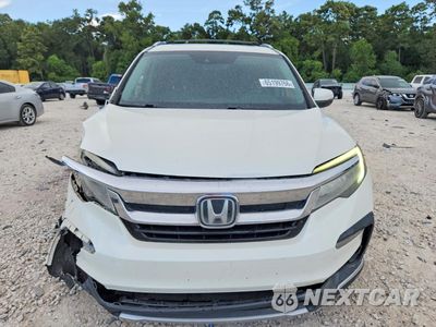 Piąte zdjęcie samochodu w środku: 2019 HONDA PILOT TOURING VIN:5FNYF6H66KB036938 - miniatura