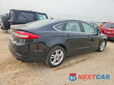 Trzecie zdjęcie samochodu z tyłu: 2018 FORD FUSION SE VIN:3FA6P0HD0JR135693 - miniatura