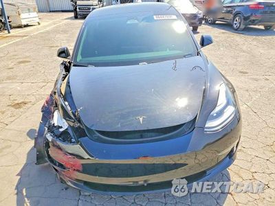 Piąte zdjęcie samochodu w środku: 2021 TESLA MODEL 3 VIN:5YJ3E1EB8MF003606 - miniatura