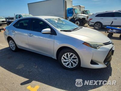 Czwarte zdjęcie samochodu z boku: 2019 TOYOTA COROLLA L VIN:5YFBURHE5KP864925 - miniatura