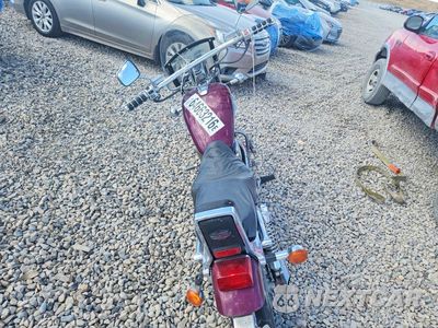 Czwarte zdjęcie samochodu z boku: 1999 SUZUKI VS800 GLP VIN:JS1VS52A1X2101950 - miniatura